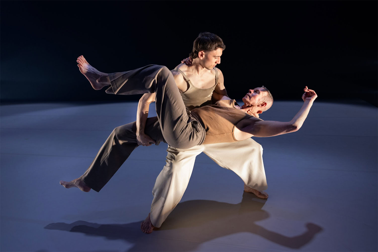 Two dancers onstage in Borderline, a contemporery dance performance by Susanna Leinonen Company. Photo: Mirkku Merimaa